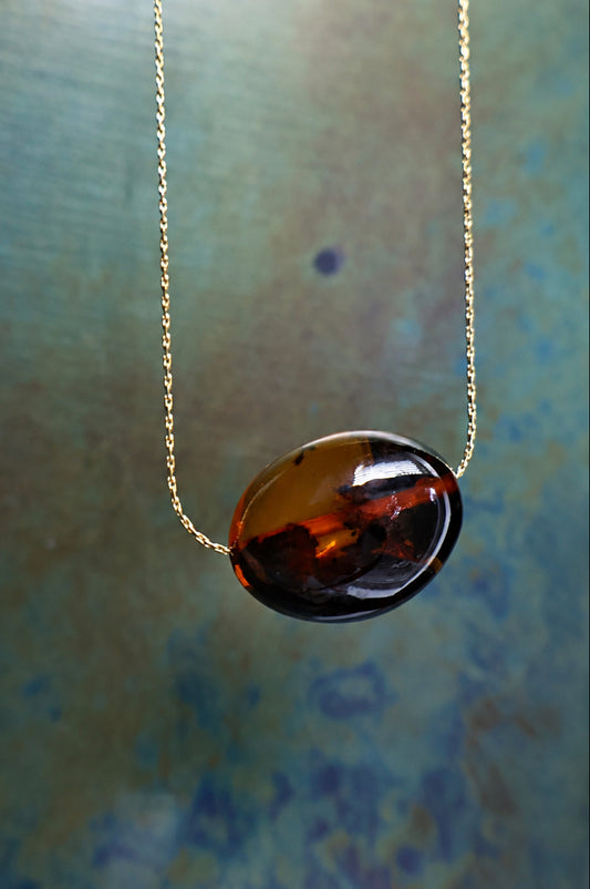 Deep cognac oval Baltic amber necklace on a fine gold chain