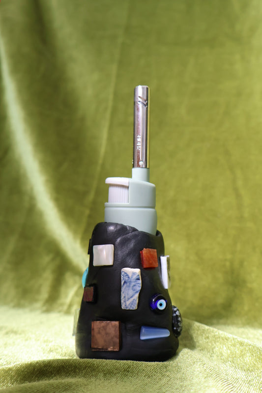 patina gem mosaic lighter holder on green velvet; lighter not included