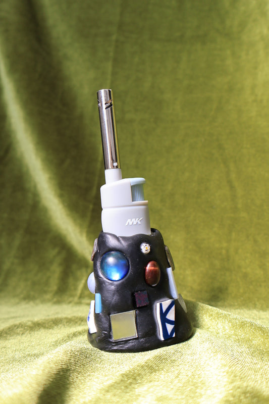 steam gem mosaic lighter holder on green velvet; lighter not included