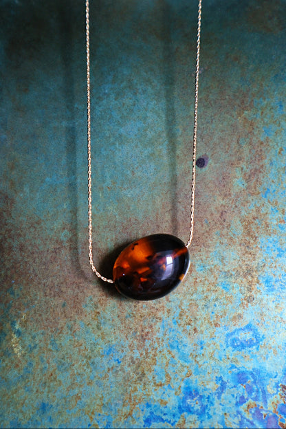 Deep cognac oval Baltic amber necklace on a fine gold chain