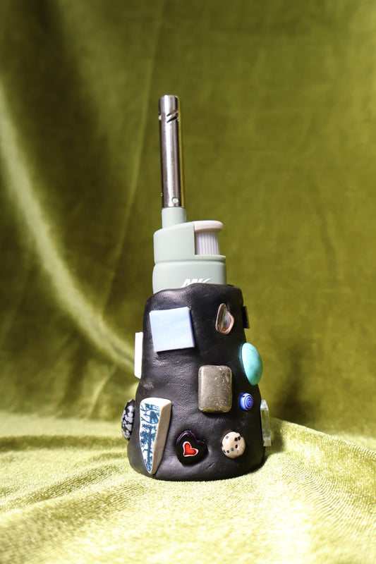 patina gem mosaic lighter holder on green velvet; lighter not included