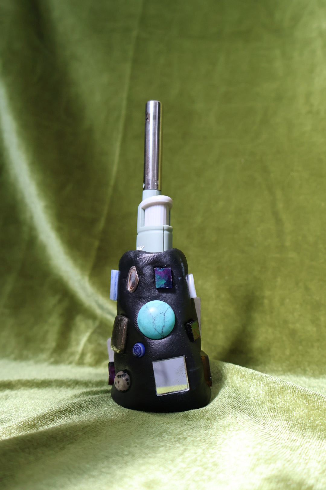 patina gem mosaic lighter holder on green velvet; lighter not included