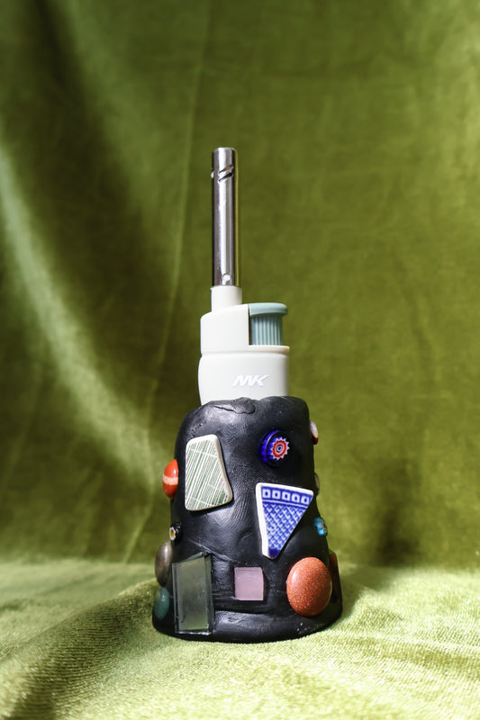 moss gem mosaic lighter holder on green velvet; lighter not included