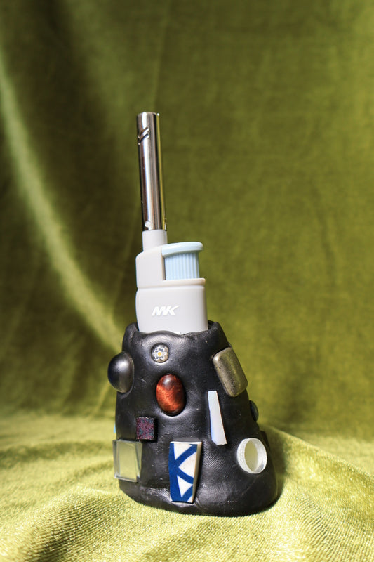 steam gem mosaic lighter holder on green velvet; lighter not included
