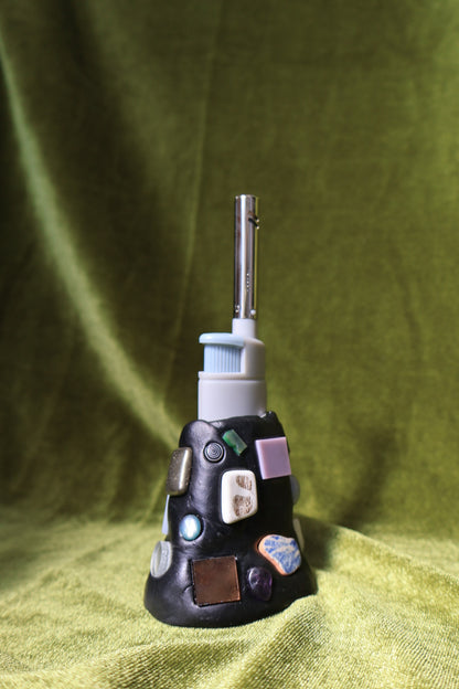 steam gem mosaic lighter holder on green velvet; lighter not included