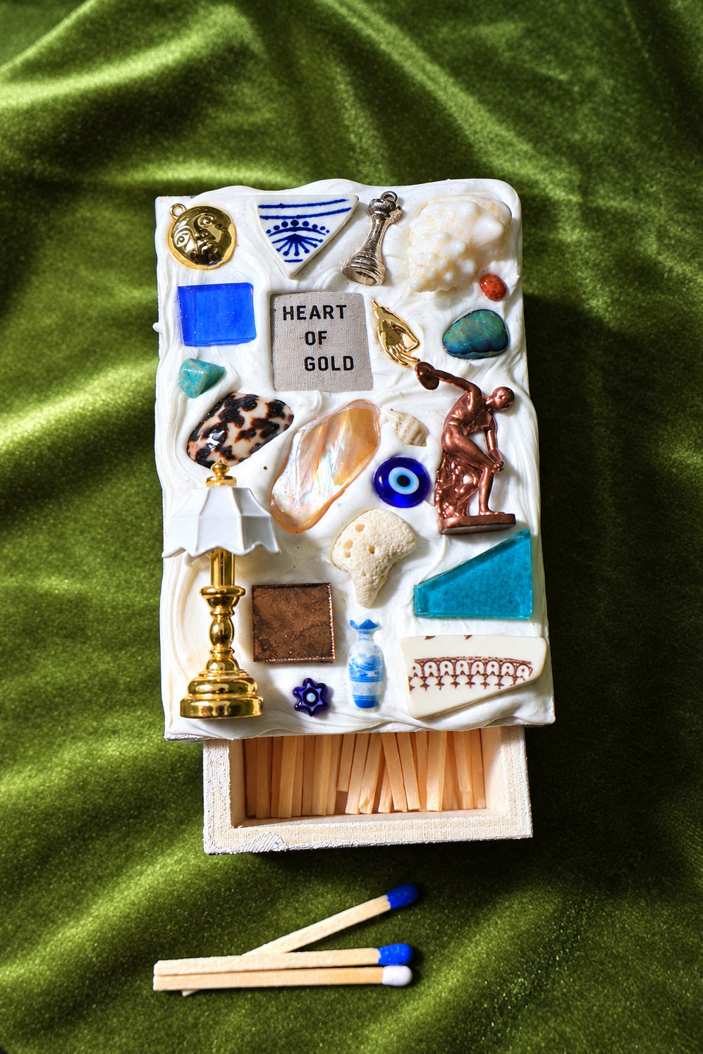 heart of gold mood board matchbox open with wooden matches