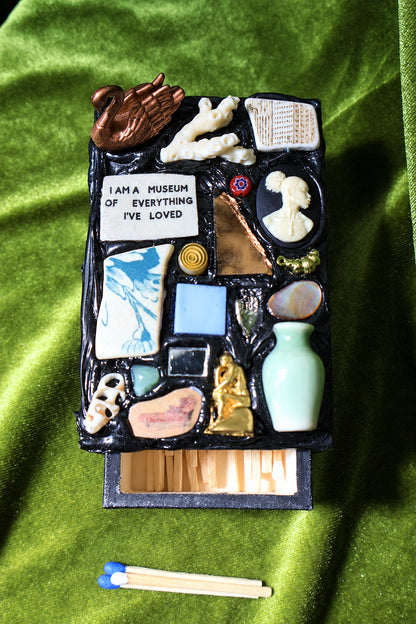 museum of everything i've loved mood board matchbox open with wooden matches